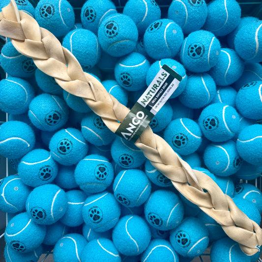 Blue tennis balls with a braided dog toy and Ancol branding.