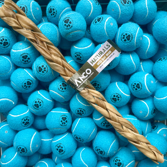 Blue tennis balls with a brown rope toy and Ancol branding on a blue background