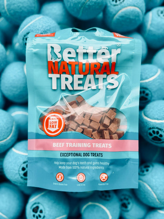 Package of Better Natural Treats beef training treats with blue balls in the background