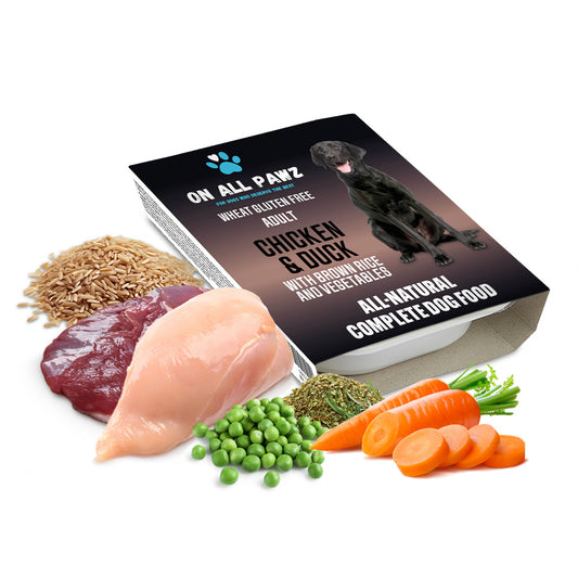 Dog food packaging with ingredients like chicken, carrots, and peas on a white background