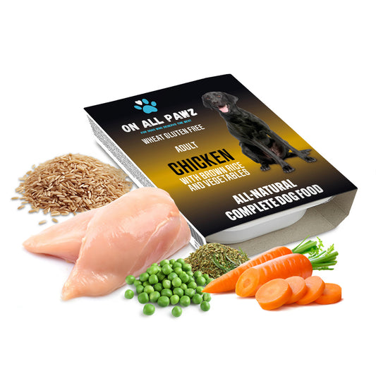 Dog food packaging with ingredients like chicken, carrots, and peas on a white background