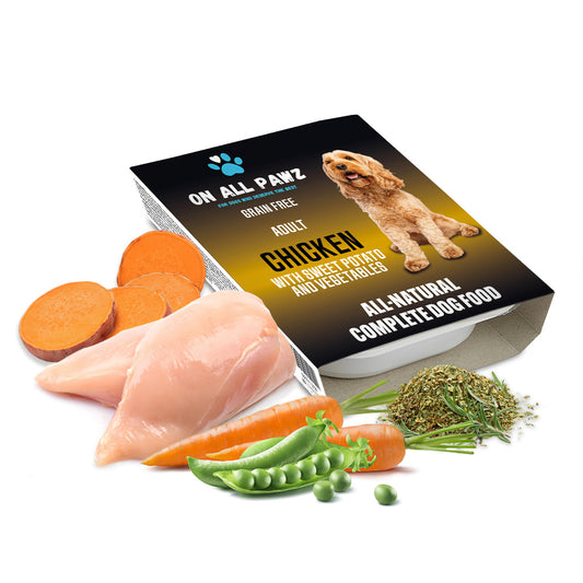 Dog food package with chicken, vegetables, and a dog on a white background