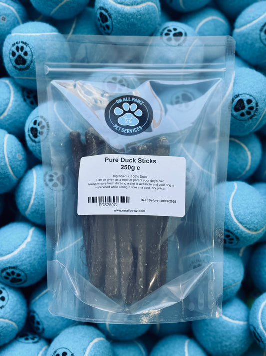 Packaging of Pure Duck Sticks 250g for dogs, displaying the product through a clear plastic bag.