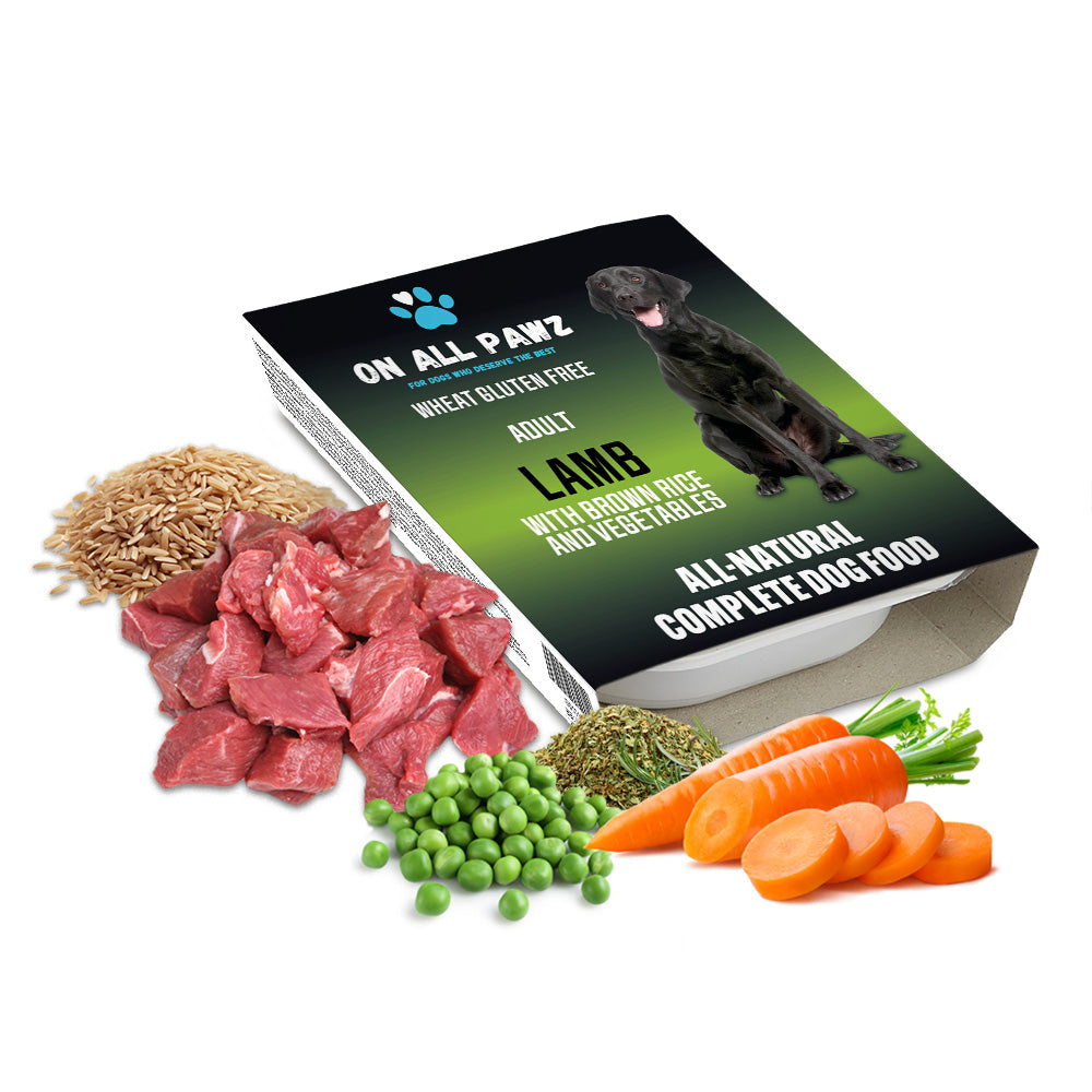 Dog food packaging with ingredients like meat, vegetables, and a dog on a white background