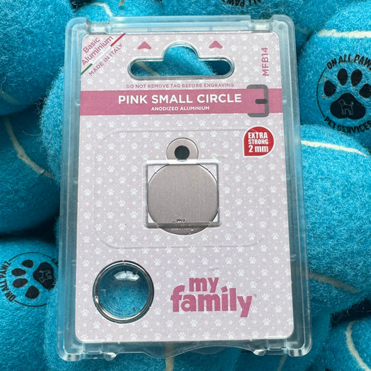 Metallic pink small circle on packaging with 'my family' branding against a blue textured background.