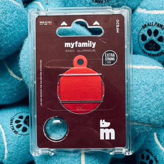 Red pet tag in clear packaging with 'myfamily' branding on a blue textured background.