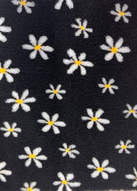 Black vet bedding with a white floral pattern