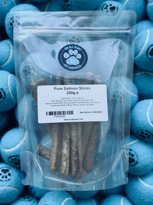 Pack of Pure Salmon Sticks dog treat in resealable packaging, with treats visible through the clear front.