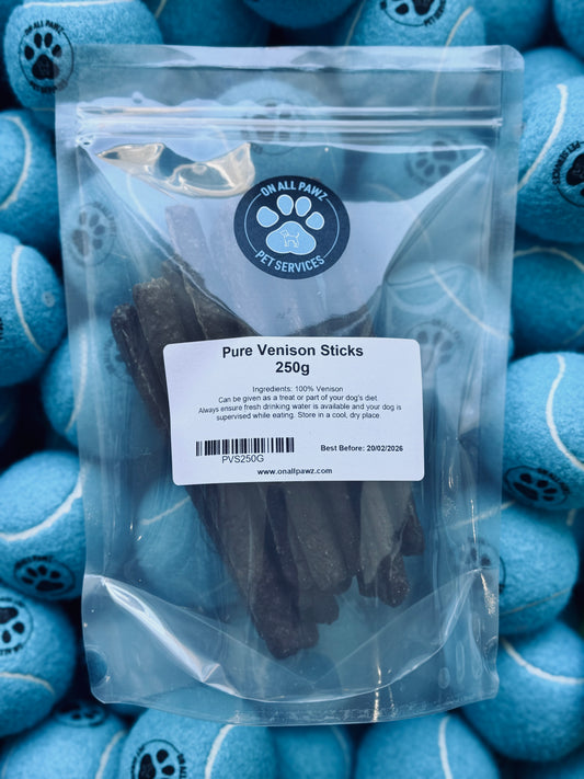 Packaged Pure Venison Sticks dog treat in a resealable plastic bag, with the brand 'On All Paws' visible on the label.
