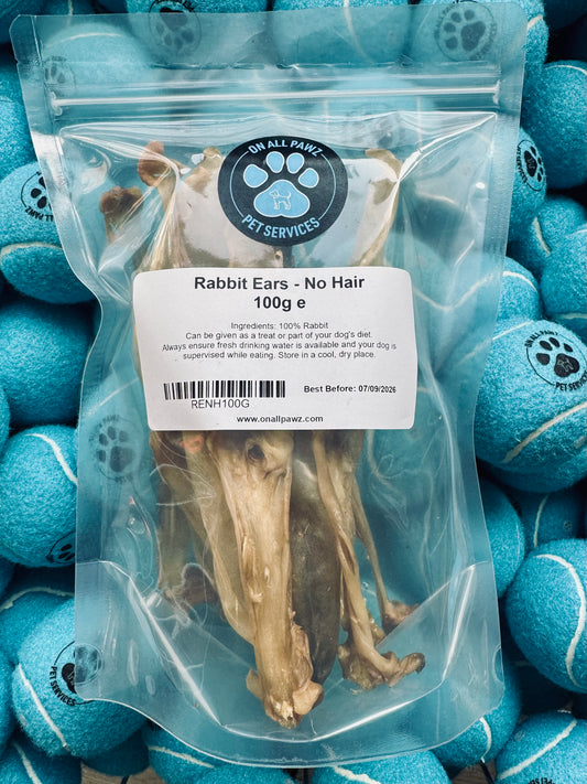 Package of rabbit ears for pets with a label on a background of blue balls.