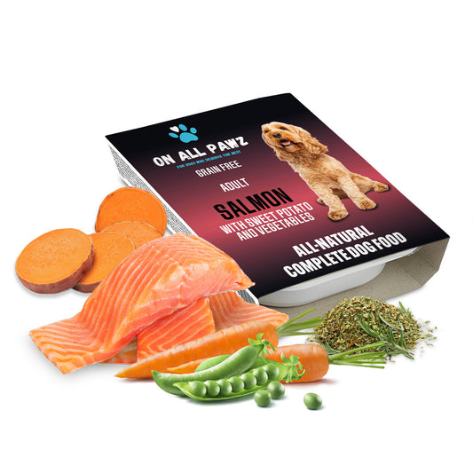 Dog food package with salmon, sweet potato, and vegetables on a white background