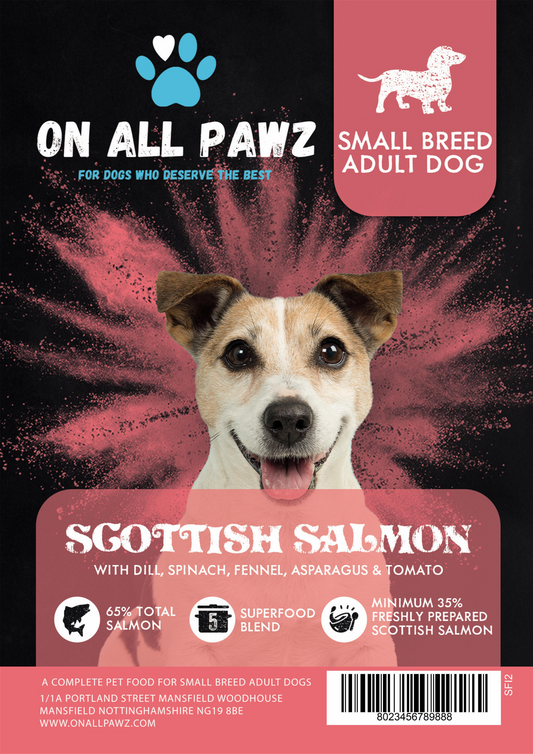 Dog food package for small breed adult dogs with Scottish Salmon flavor on a red and black background.