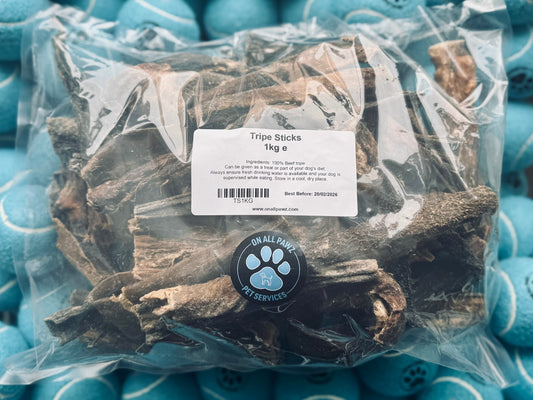 Packaged Tripe Sticks dog treat in a clear plastic bag with a label showing the product name and brand.